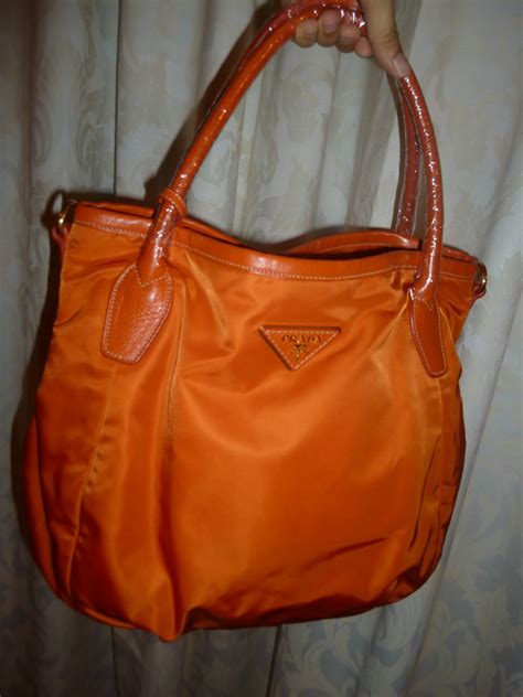 bob prada orange|Orange Embroidered handbag .